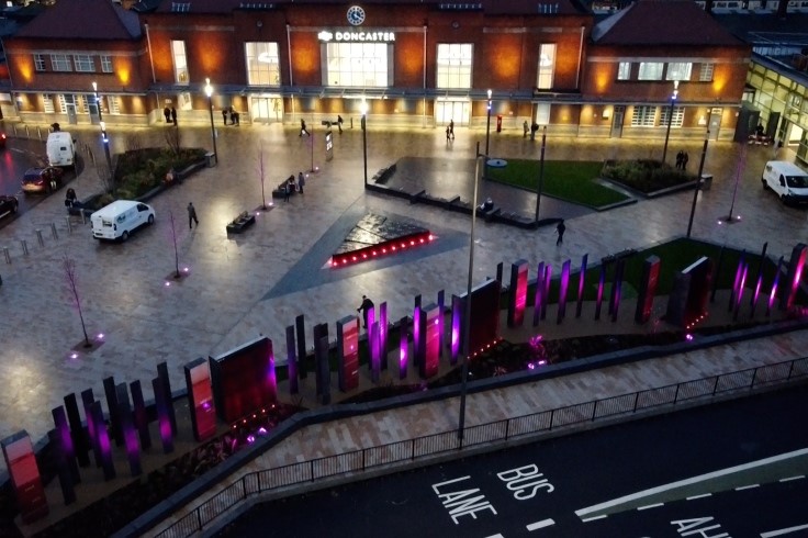 Doncaster railway station forecourt scheme lit up at night